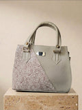 Beige and burnt red two-tone hand-tooled leather handbag with shoulder strap, handmade in México