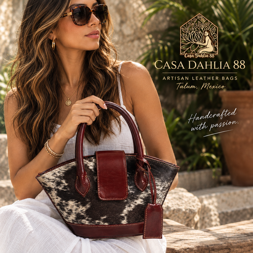 Woman carrying burgundy and cowhide leather flare tote bag